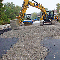 Bouwplaats toont het gebruik van Basetrac® Nonwoven Geofabric in de versterking van de funderingslaag