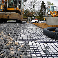 Grind en aarde op Basetrac® Duo-C geocomposiet