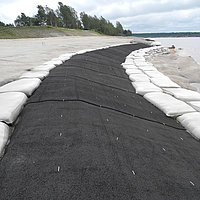 Aanpasbare SoilTain zakken van Huesker voor veilige waterbouwkundige constructies