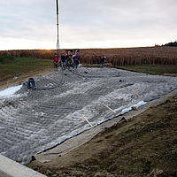 Vullen van Incomat Crib betonmat met betonpomp