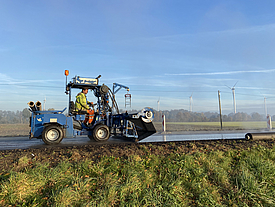 HaTelit leggen met behulp van voertuig en traverse leggen